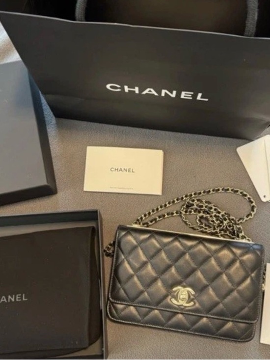 CHANEL Handbags - CHANEL Black Quilted Lambskin Shoulder Bag with Gold Hardware